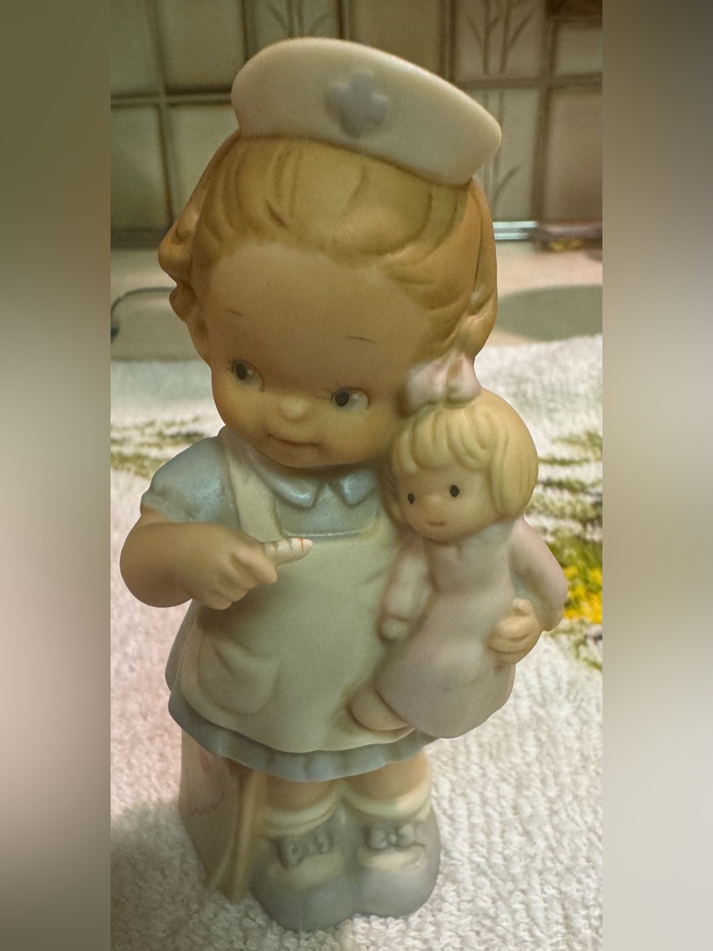 Vintage 1994 Enesco precious moments, ceramic little girl, dressed as a nurse